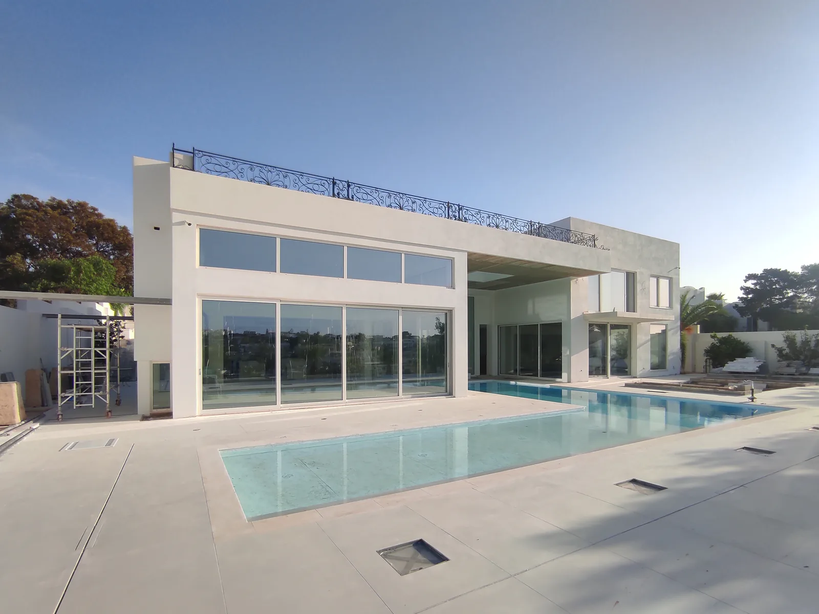 Seafront Villa glazed elevation beside the pool